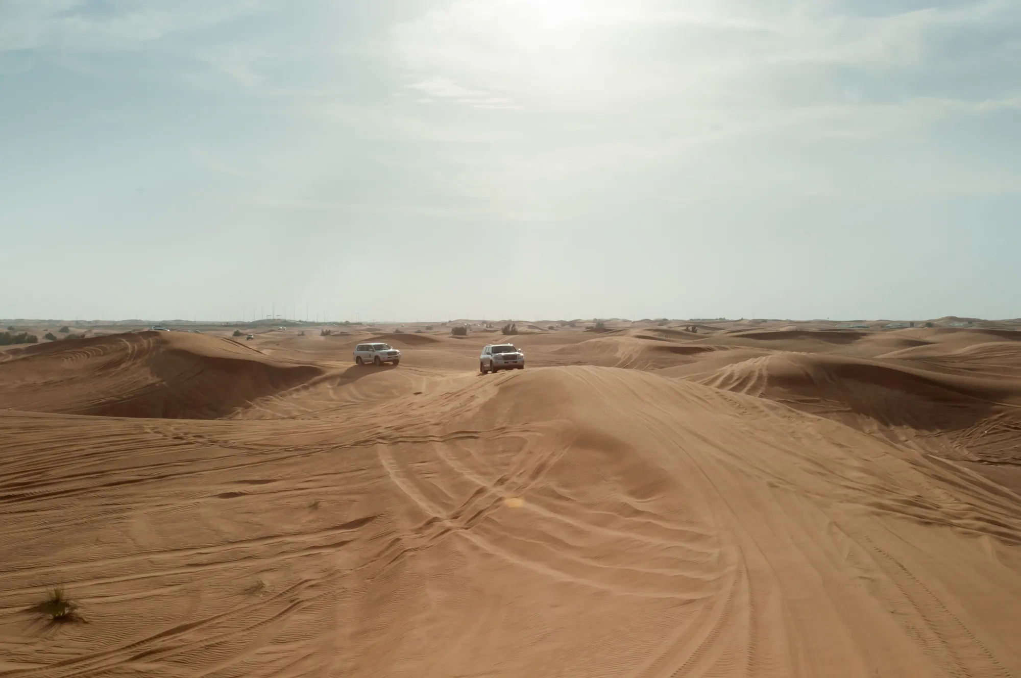 4x4s among red dunes at Al Madam, near Big Red